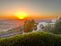 Watching the sunset from our balcony.
