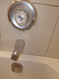 Shower faucet loose & twisted.
Luke warm water between 5 - 6 pm