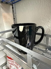 cracked coffee mug that Host company sent ME the picture of