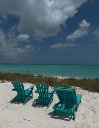 Directly behind Villa to beach access