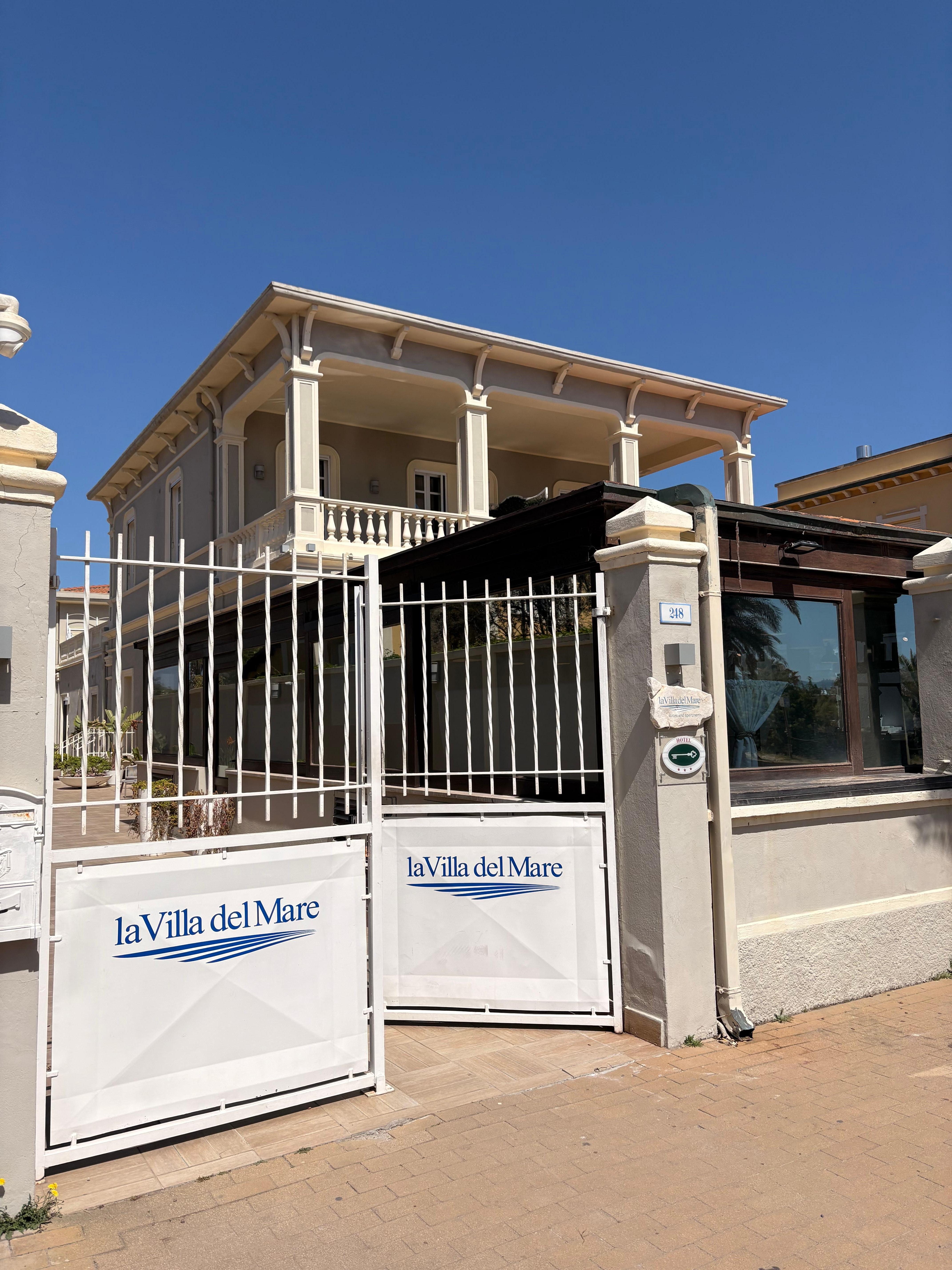 Front entrance off pedestrian beach road. 