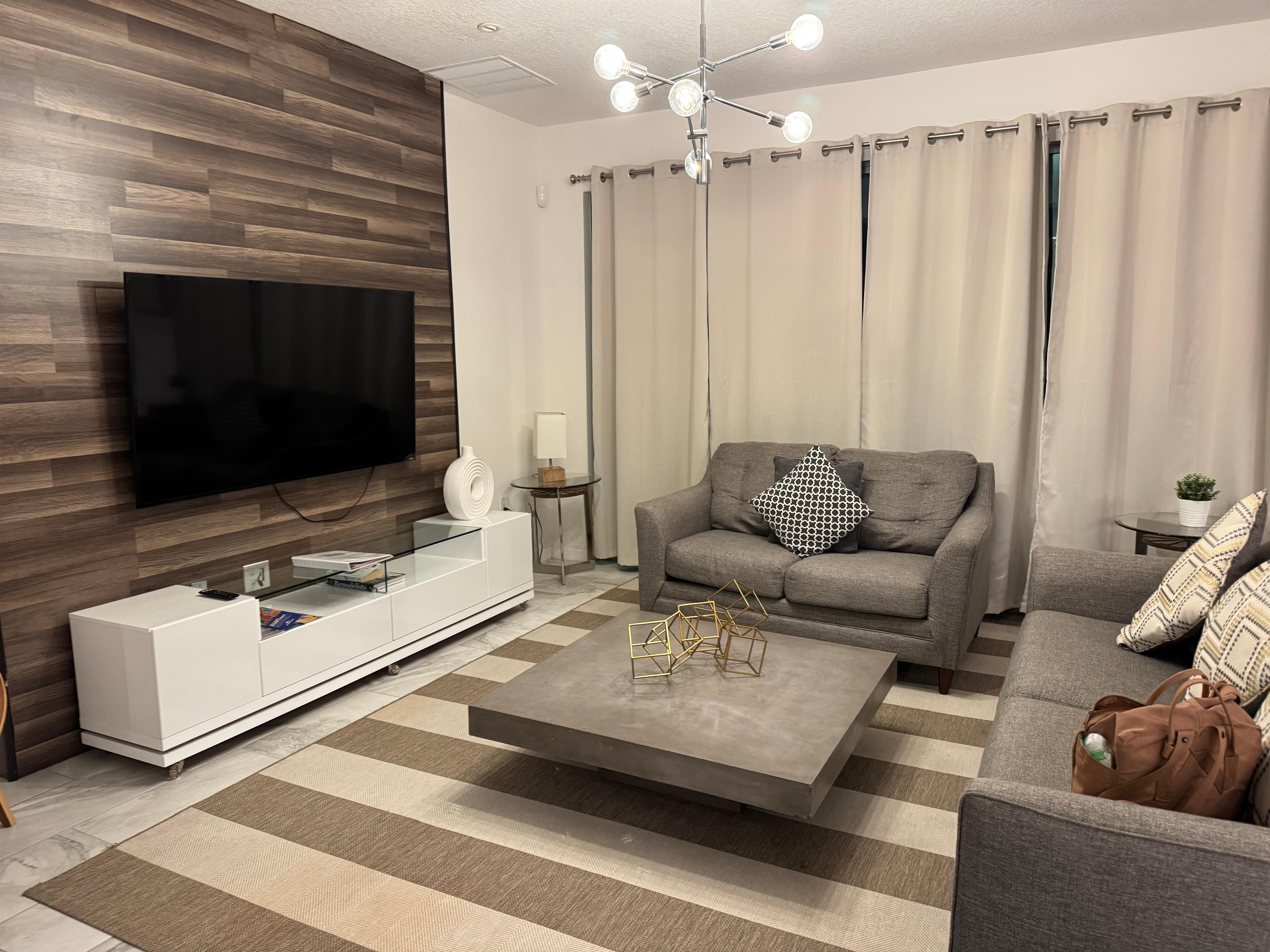 Living room great large tv and comfy couches