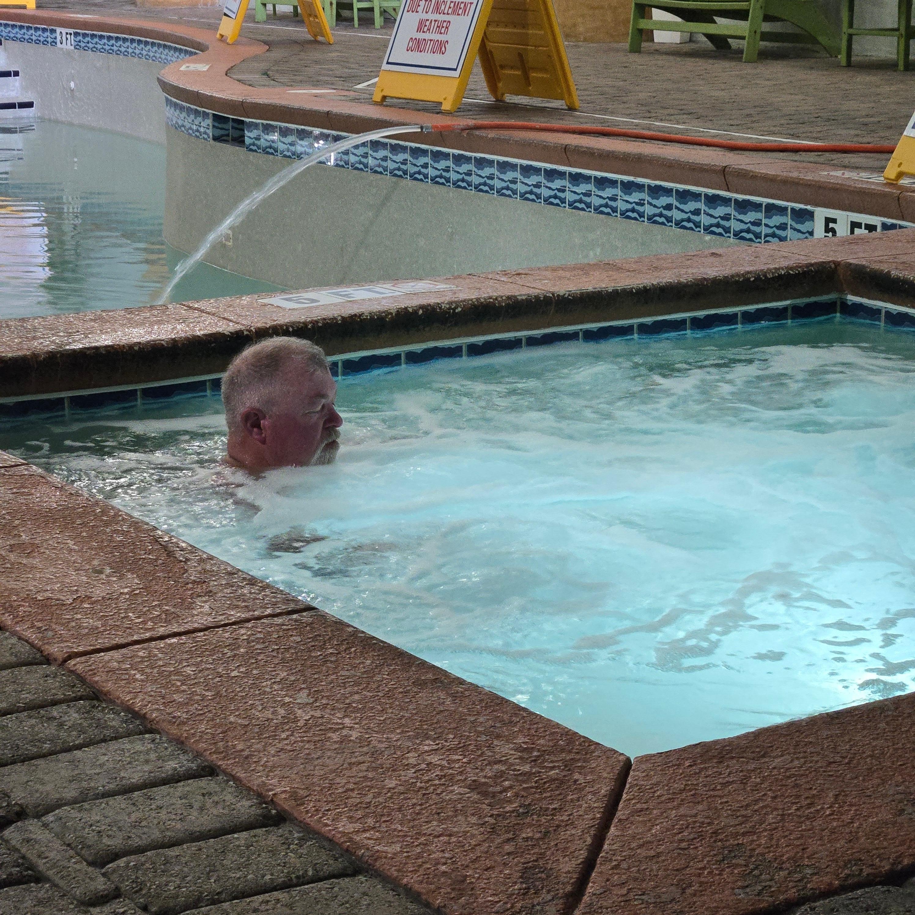 Inside hot tub and heated pool