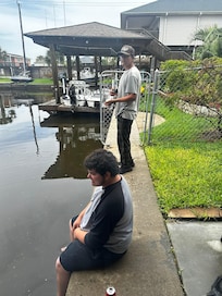Fishing at the dock downstairs.