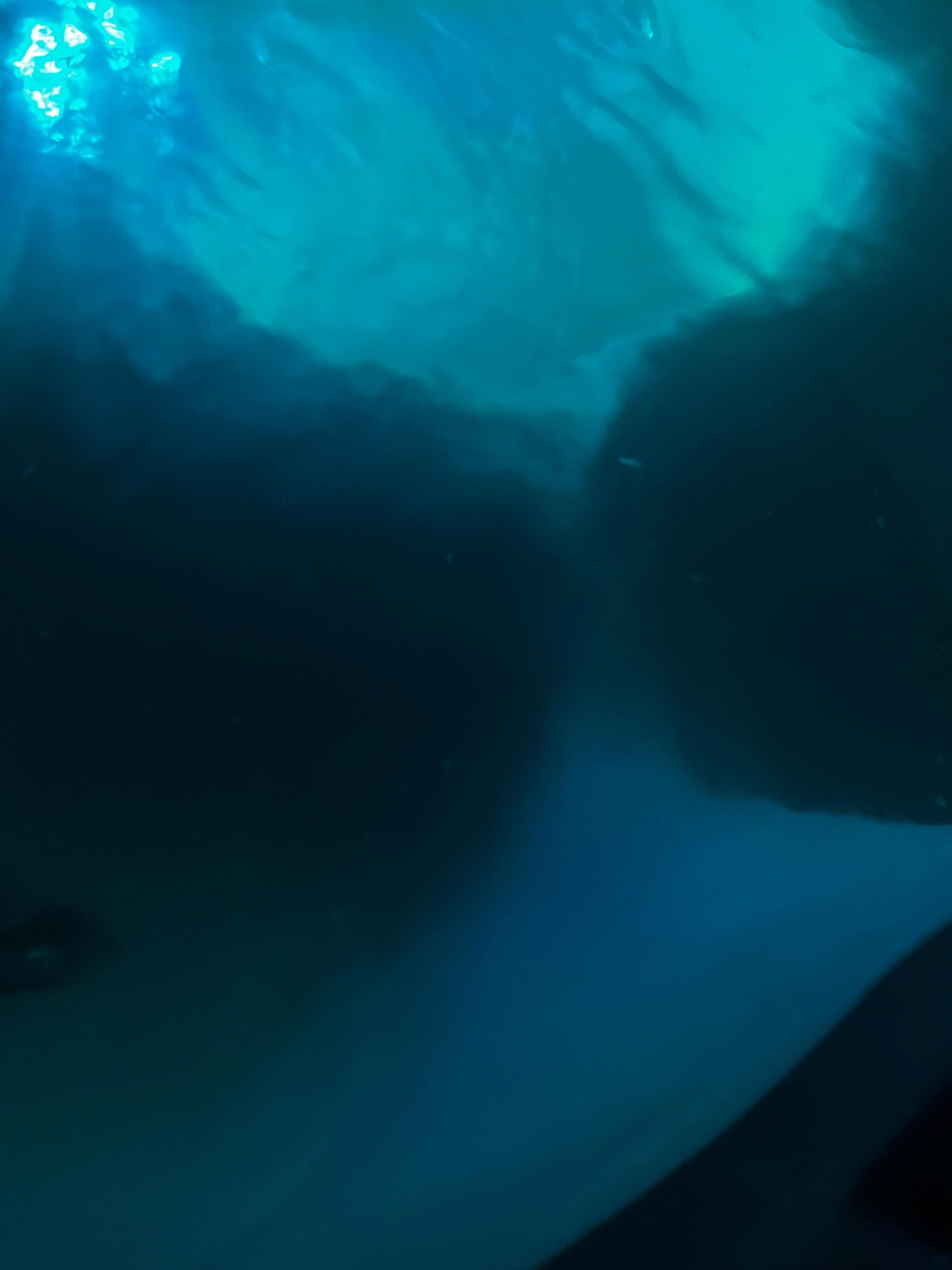 Huge flakes of debris all around hot tub and slimy surface. 