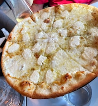 If you stay at the Canopy, you must order the Bianca pizza! So delicious!
