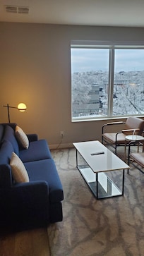 Great living room right by the full kitchen