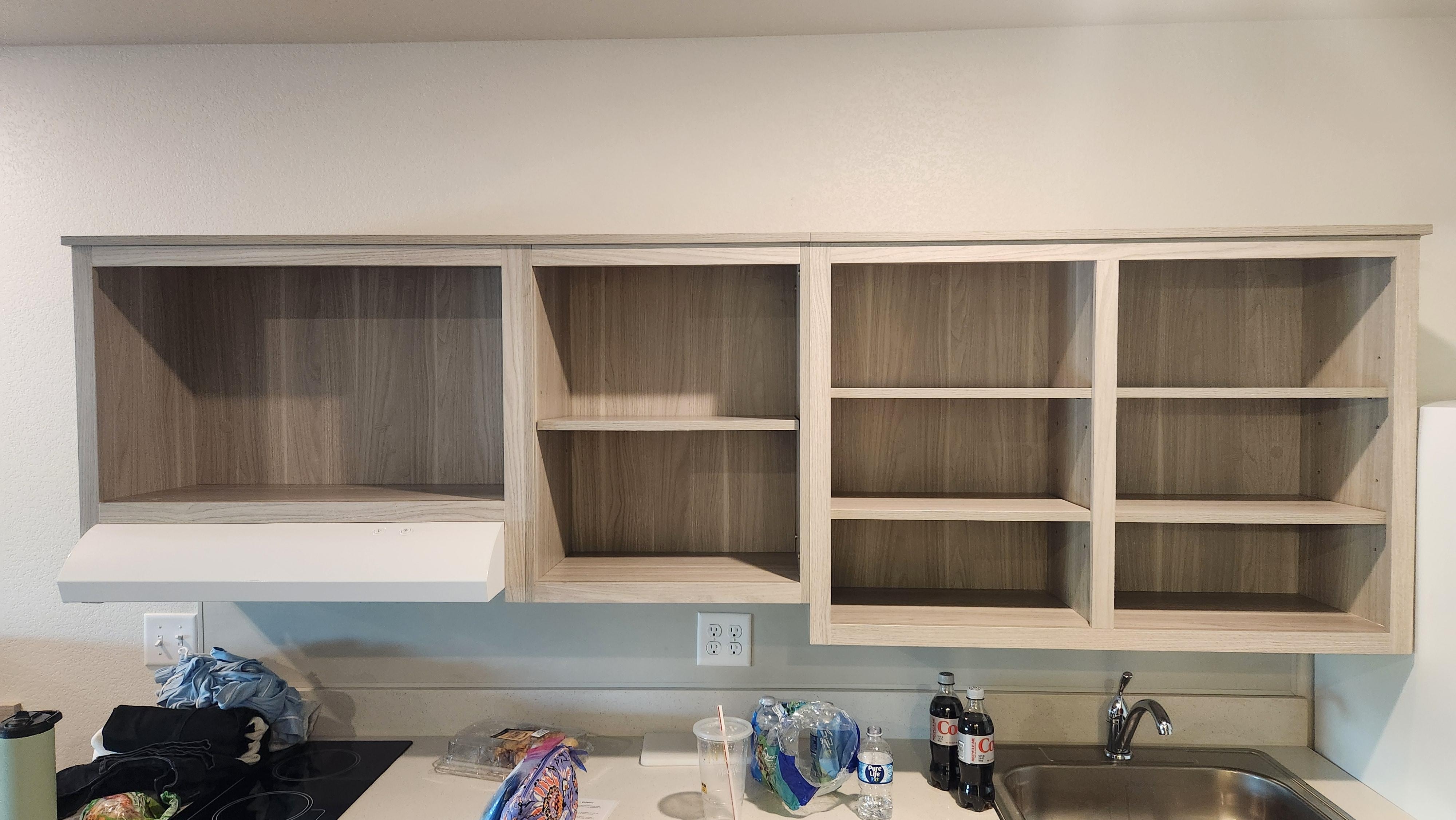 Empty kitchen cabnits.