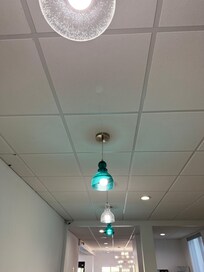 Blue light fixture globe broken.