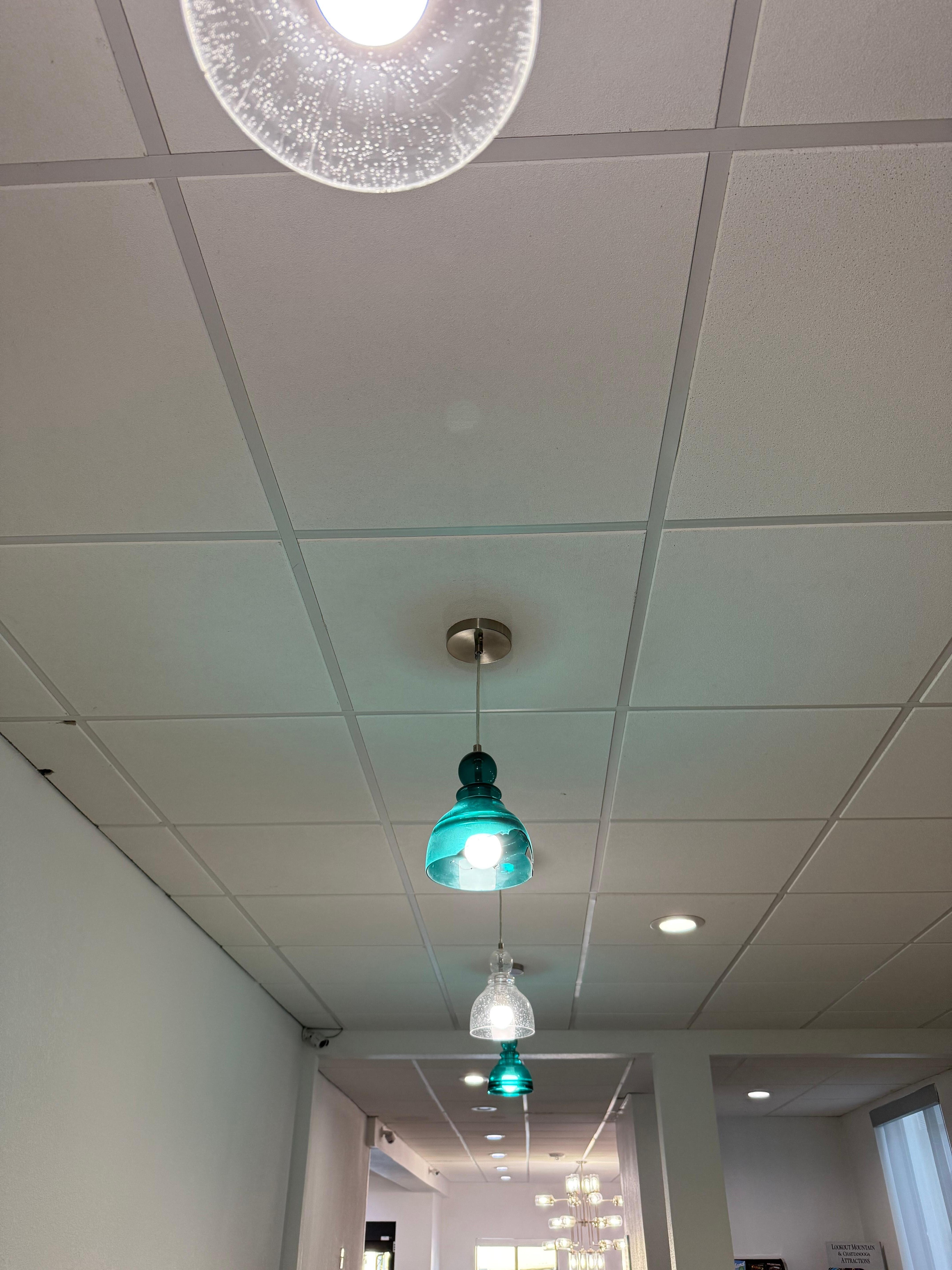 Blue light fixture globe broken. 