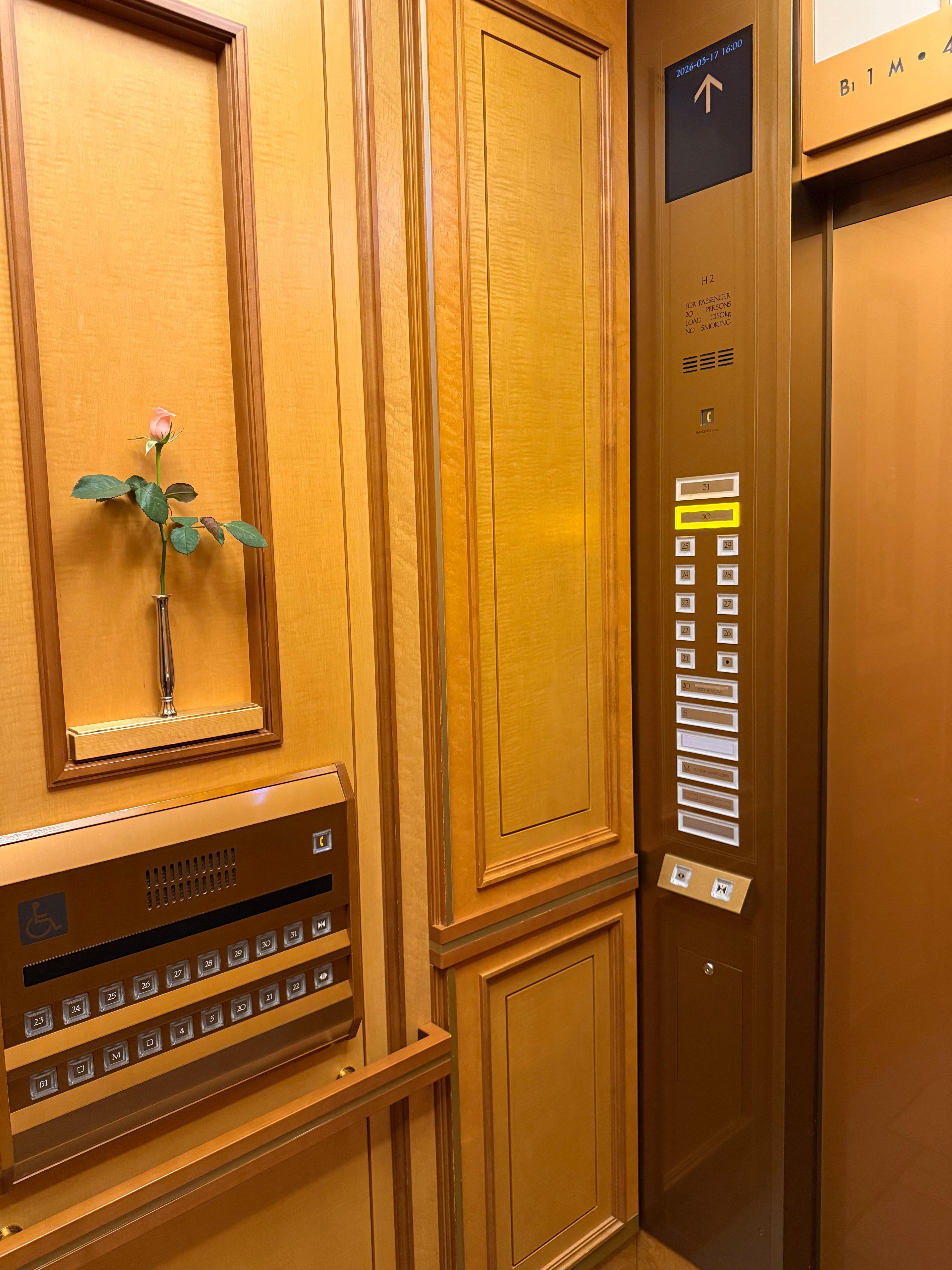 Fresh flower in the elevator: What a nice touch!