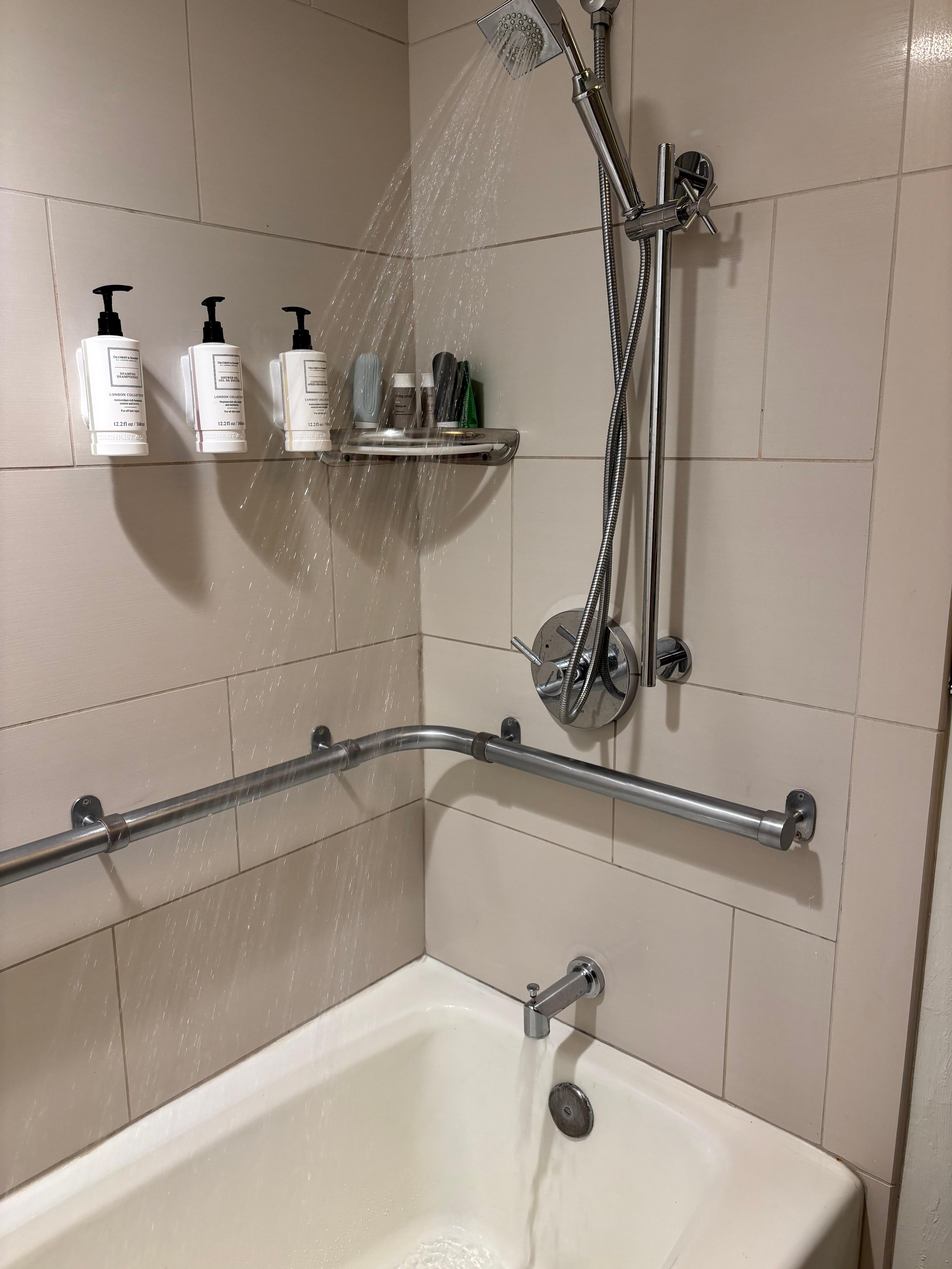 Weak pressure and water pouring from both faucet and showerhead — diverter needs repair.