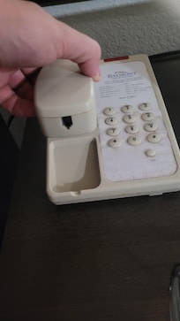 The hotel room phone was missing the cord that connects the headset to the phone itself making it unusable.