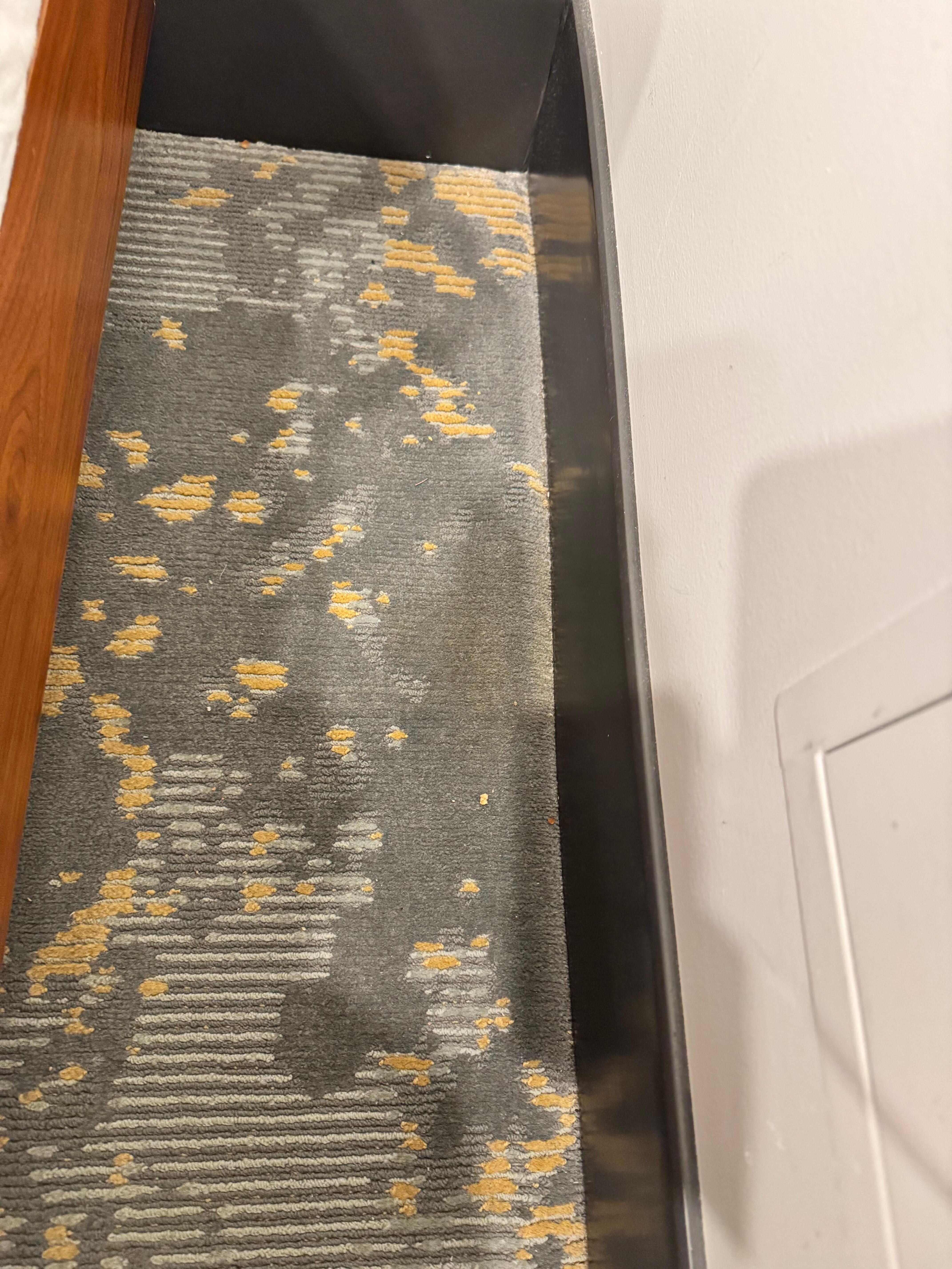 Side of bed at check in - crumbs