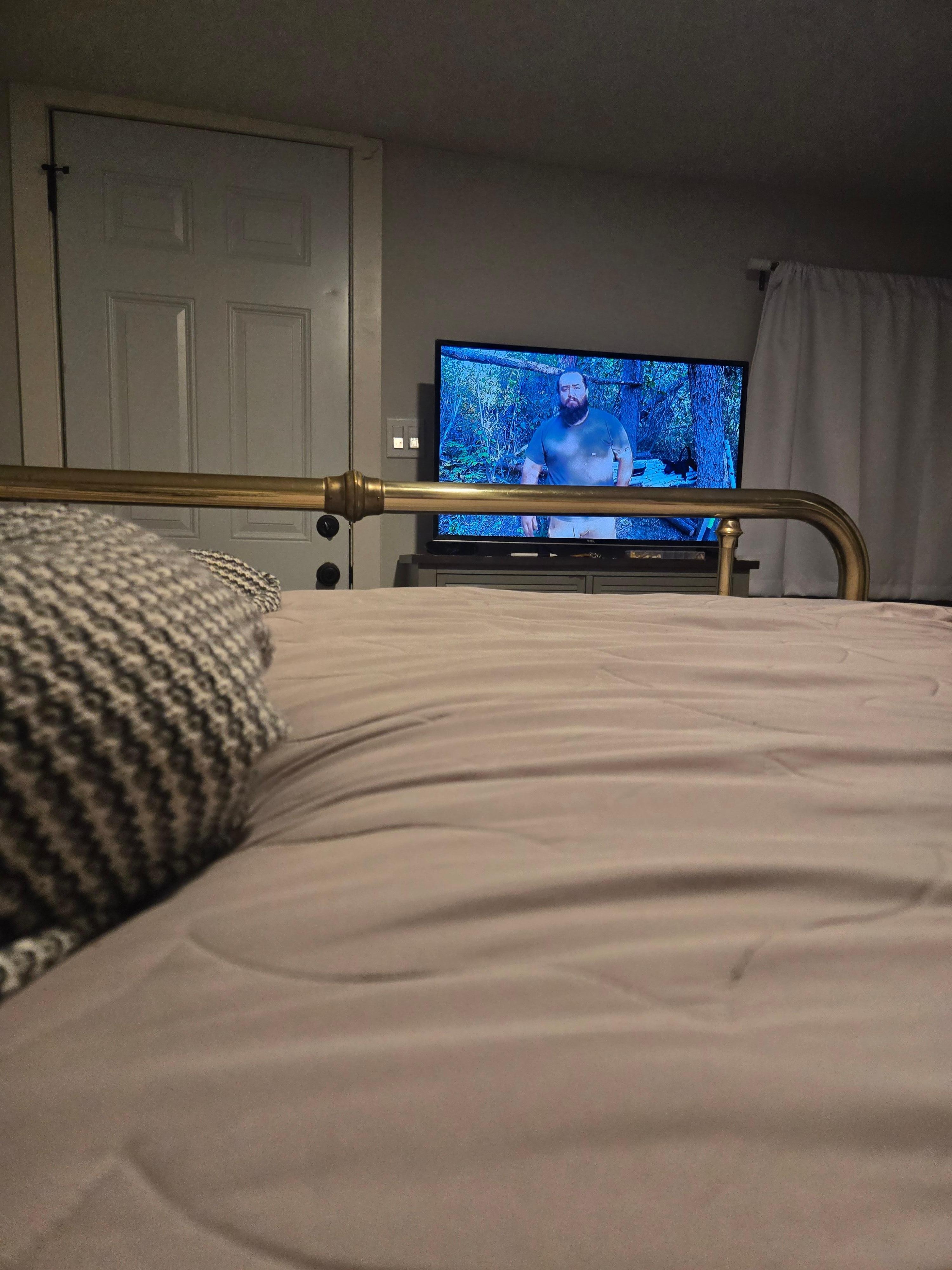 View of TV from bed