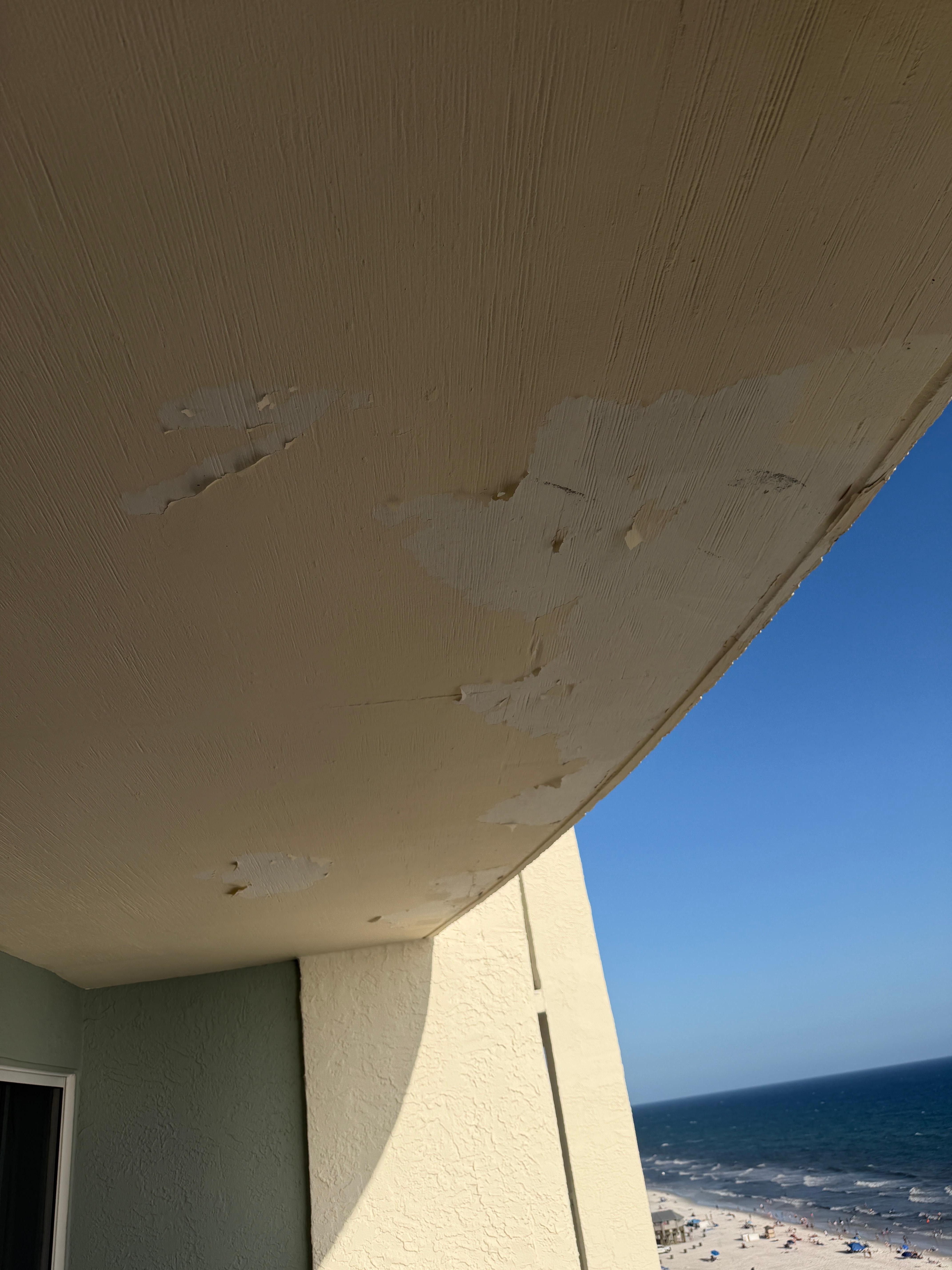 Peeling paint on the terrace.  Chunks came down during our stay