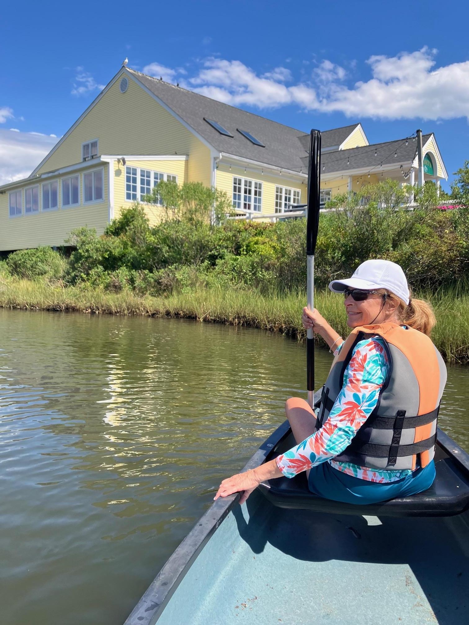 rowing the canoe to Clancey's