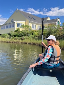 rowing the canoe to Clancey's