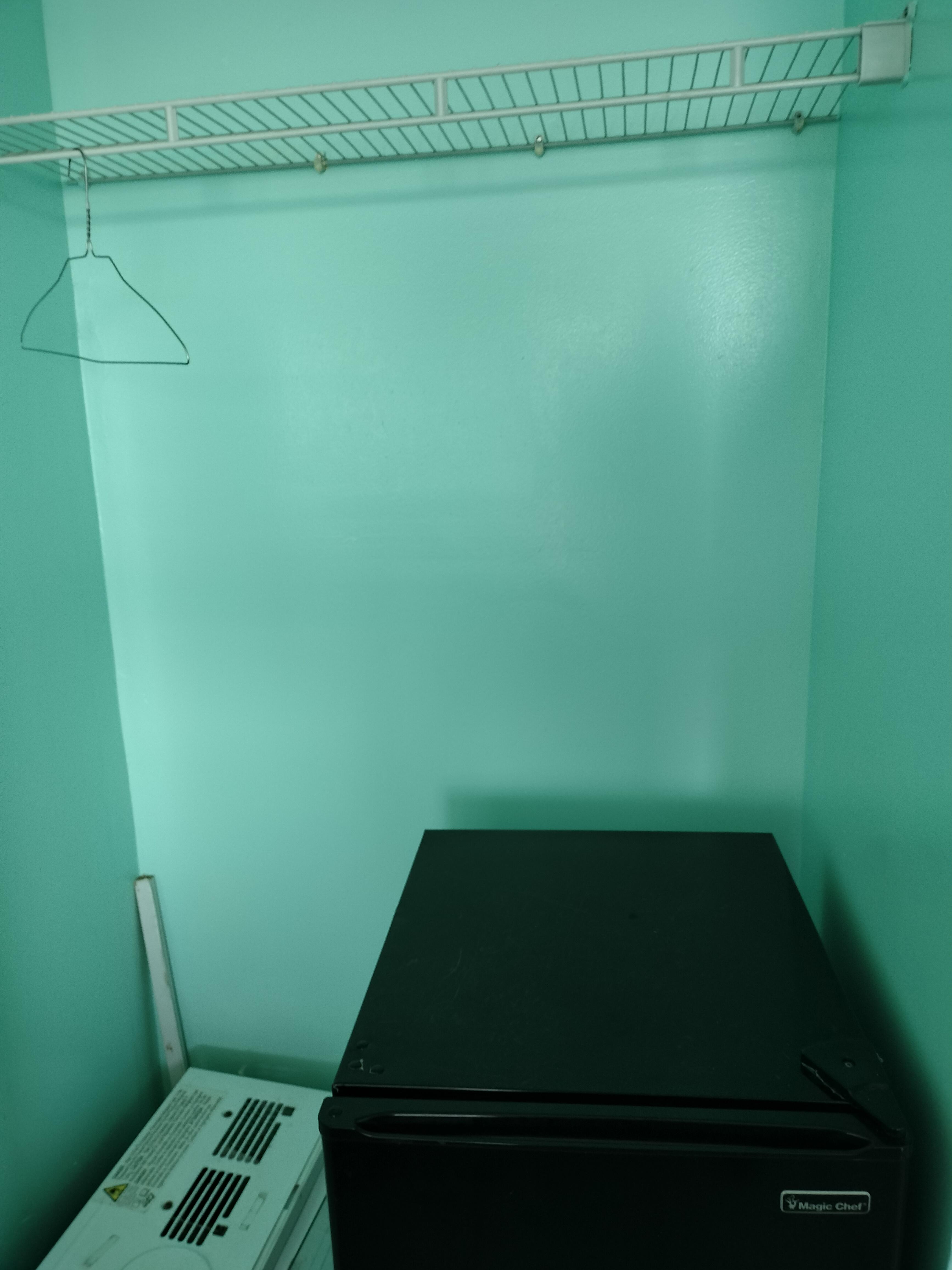 One hanger and fridge that whined like a puppy.