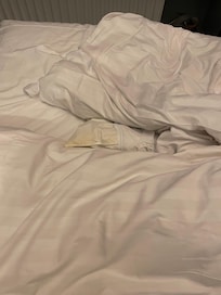 Comforter stained yellow.