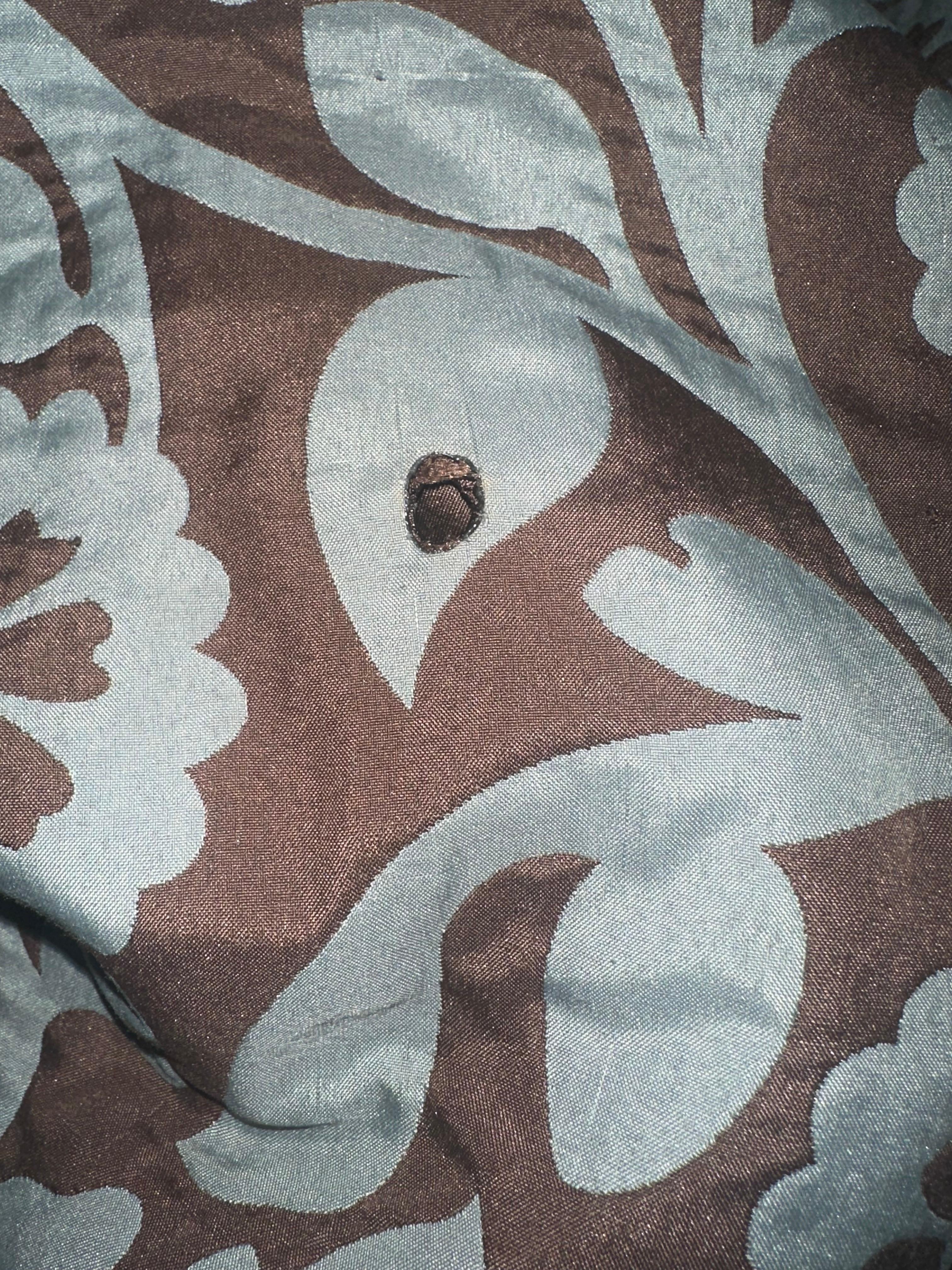 Burnt holes and comforter