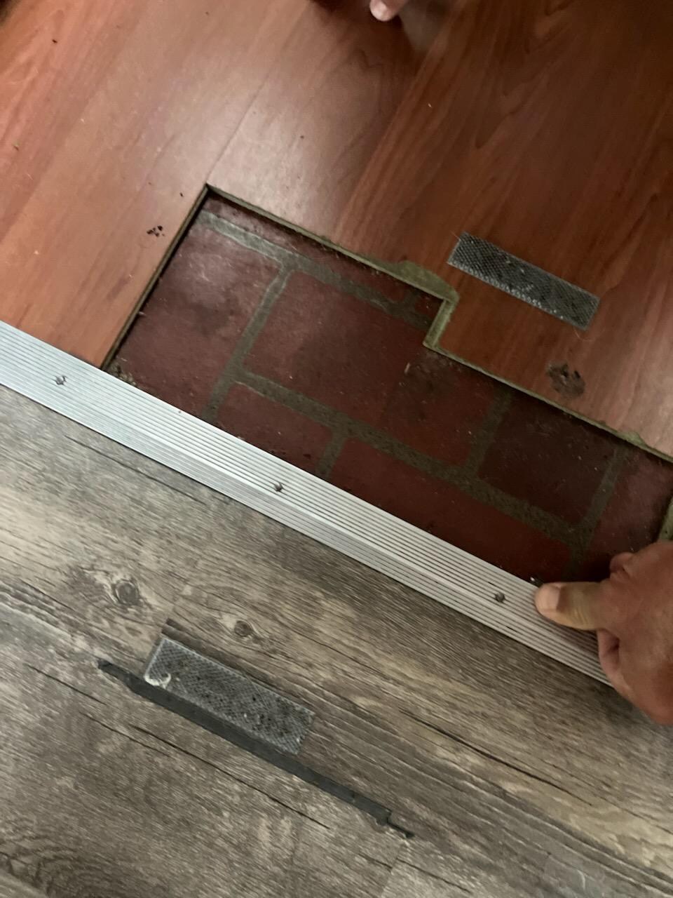 Missing floor in kitchen causing cut