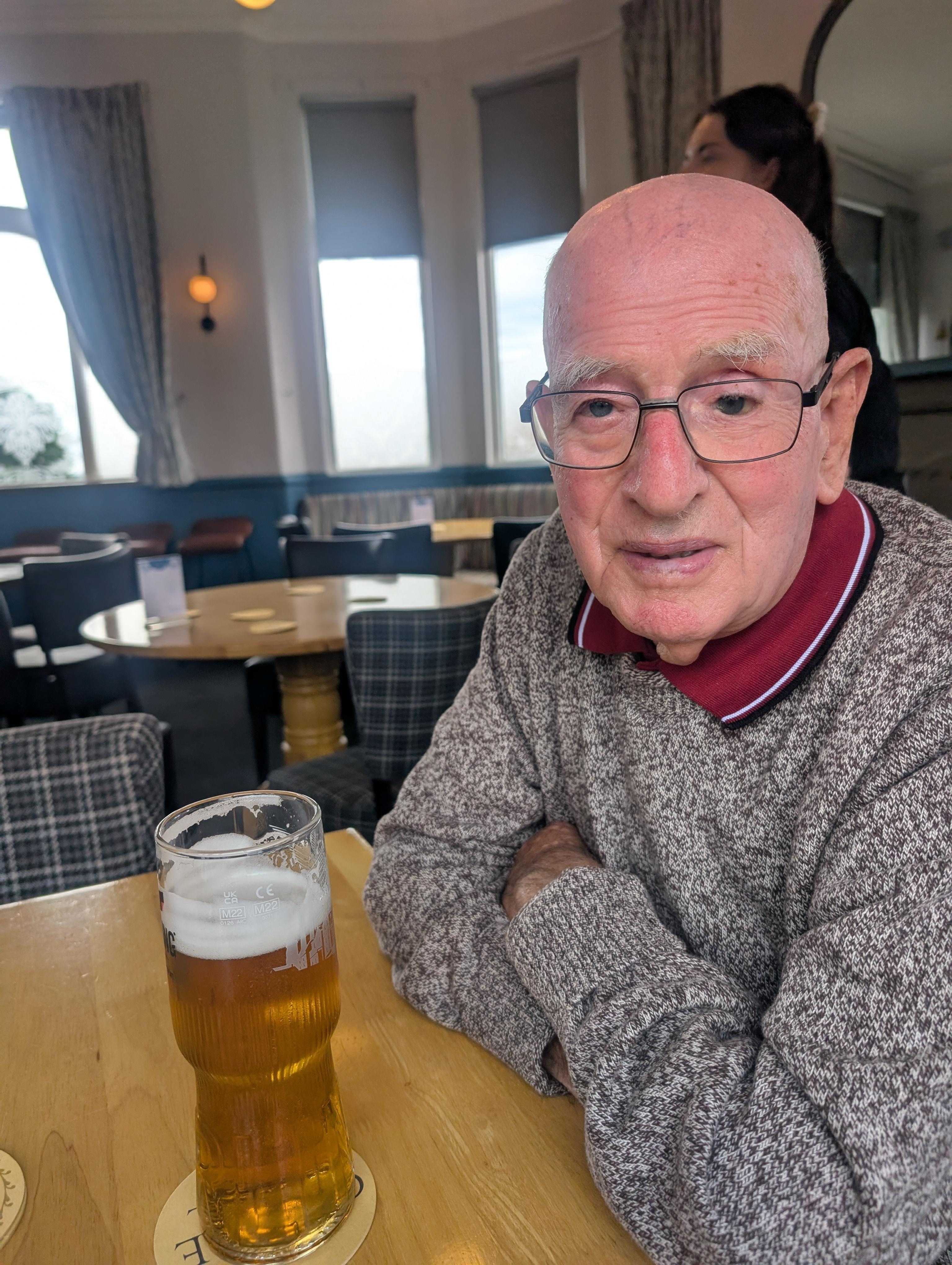 My husband enjoying a pint.