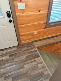 As soon as you walk in you have about a foot of space before you meet the stairs. If you aren’t paying attention when you’re unloading your vehicle you will fall down the stairs.