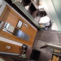 View from top bed - door/bathroom