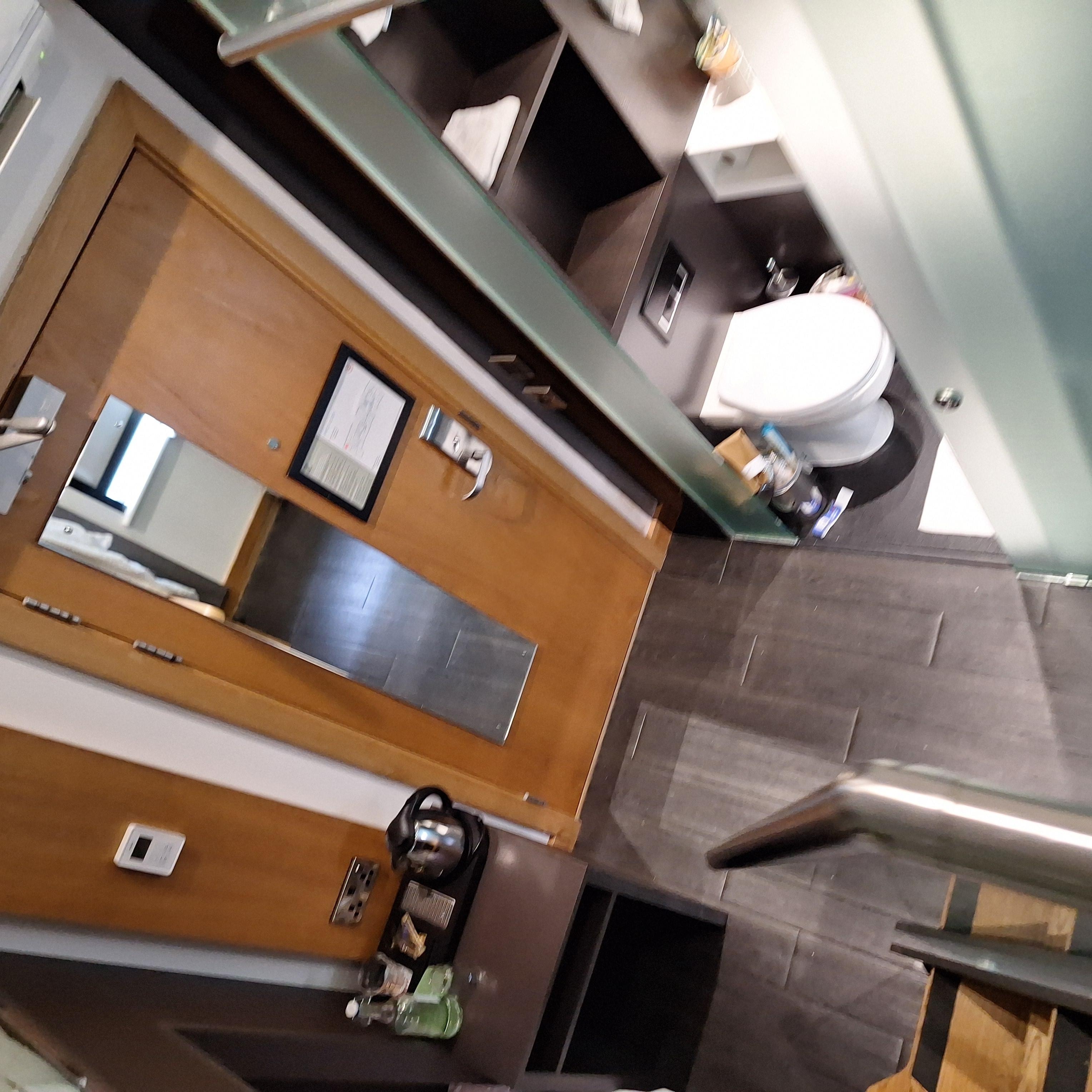 View from top bed - door/bathroom