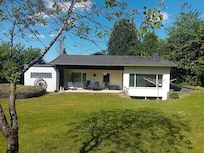 De accommodatie vanuit de tuin