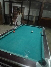 Playing pool with my daughter.