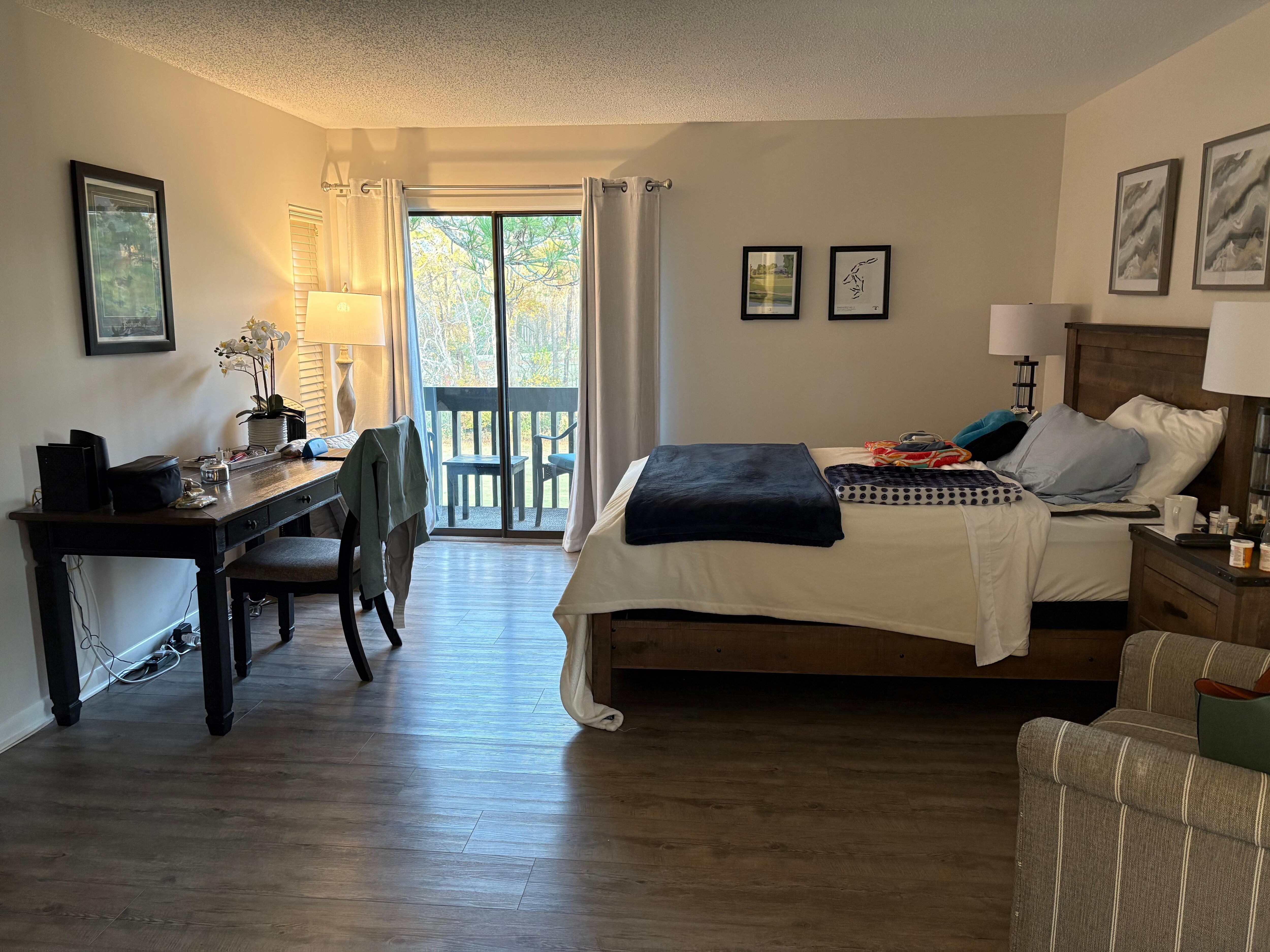 Master bedroom - plenty of space, great they included a floor fan! Not a king sized bed but comfortable. 