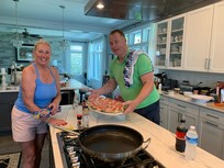 Photo of our family from Holland preparing a yummy dinner . . .