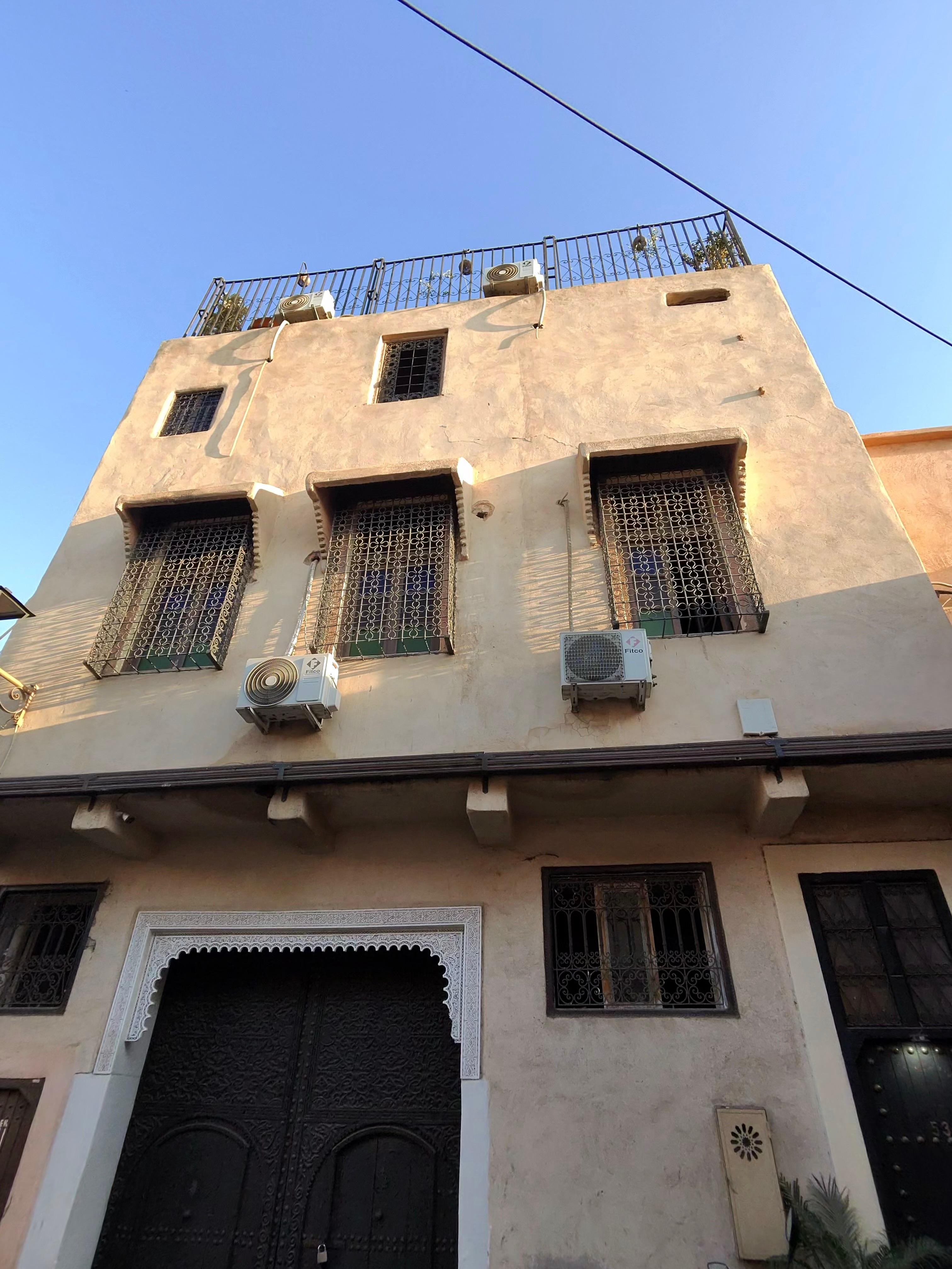 Frontal view 
Somewhat ridiculous if you own a business have a sign on your building to let your guests know they are at the right place 