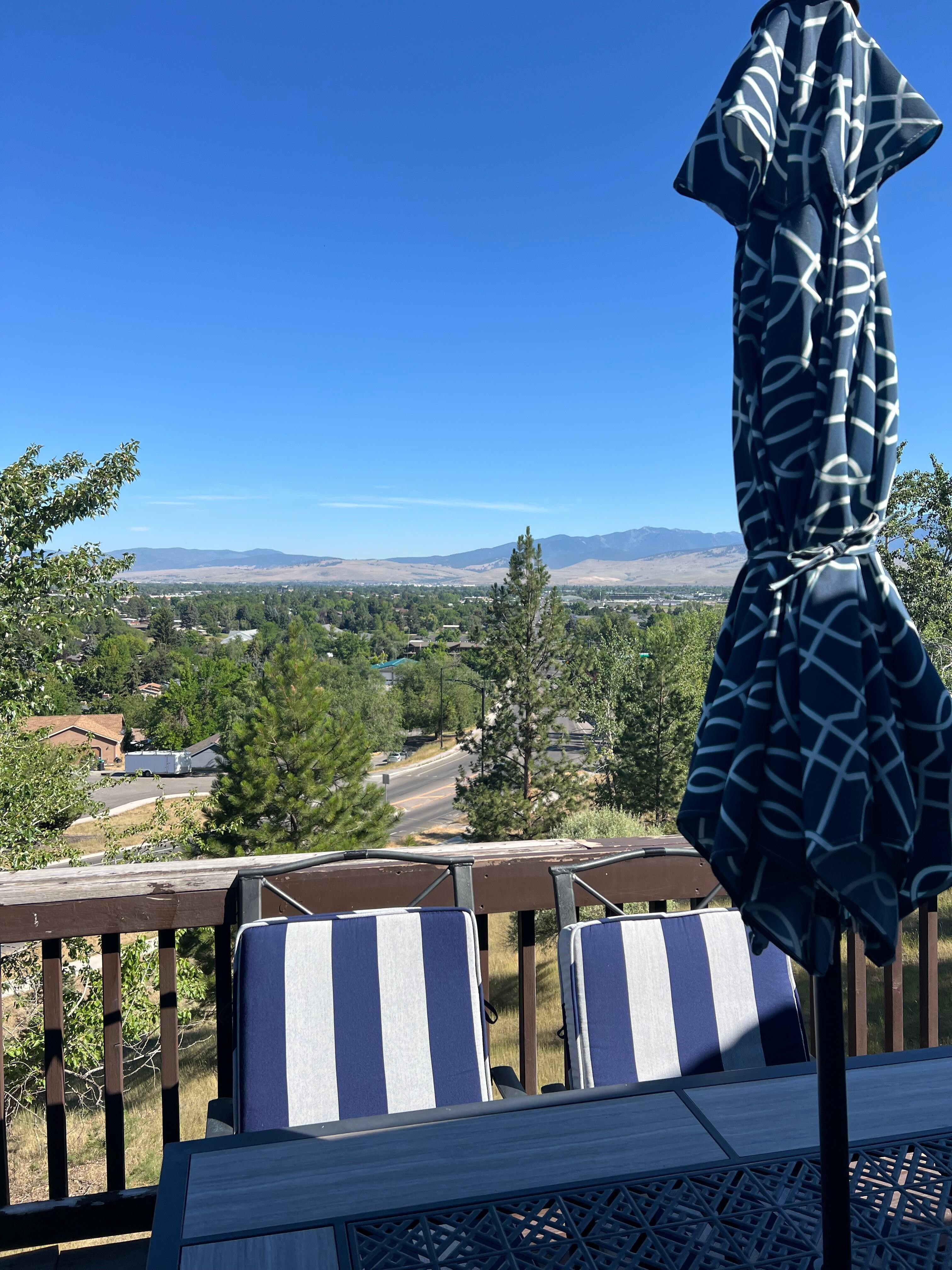 Top patio view, big comfy table to eat & take in the views