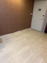 missing/incomplete trim work near elevators