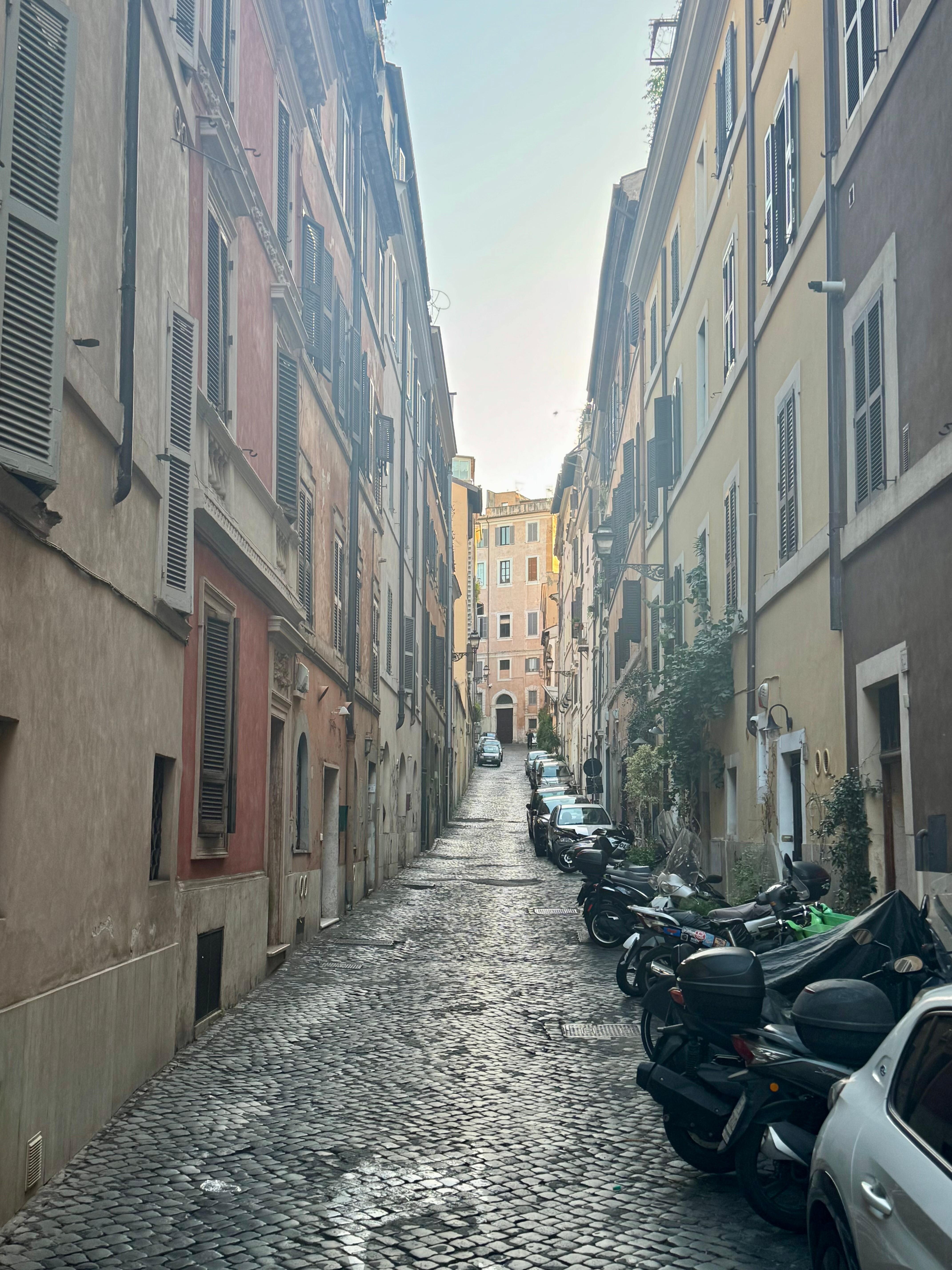 A narrow little street with minimal business activity. 