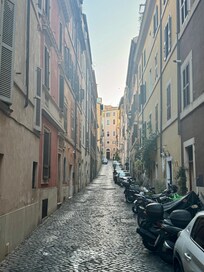 A narrow little street with minimal business activity.