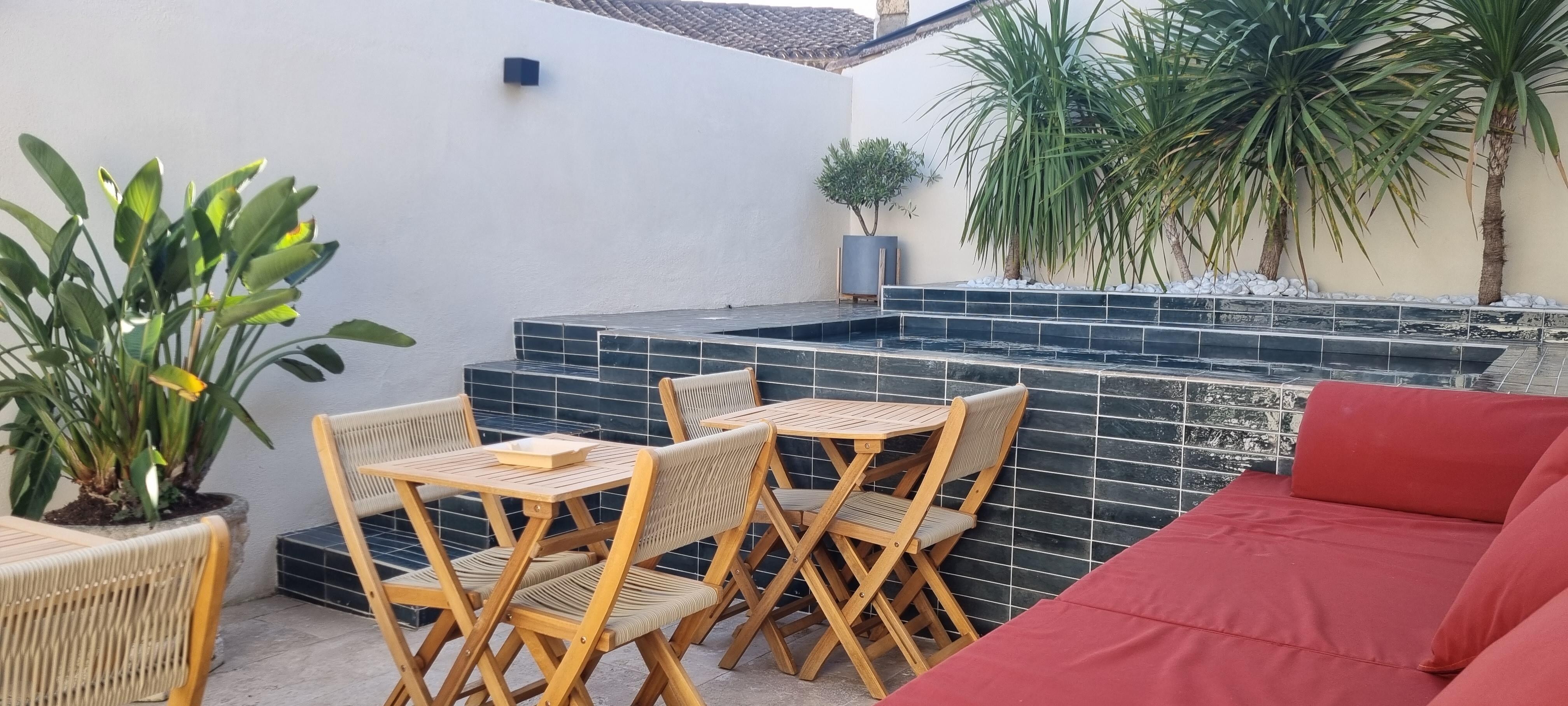Courtyard and plunge pool right outside our room ( George)