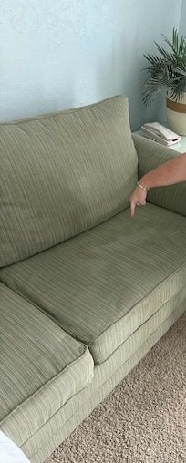 The couch is very stained