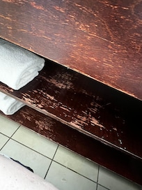 Multiple pieces in furniture were flaked off.