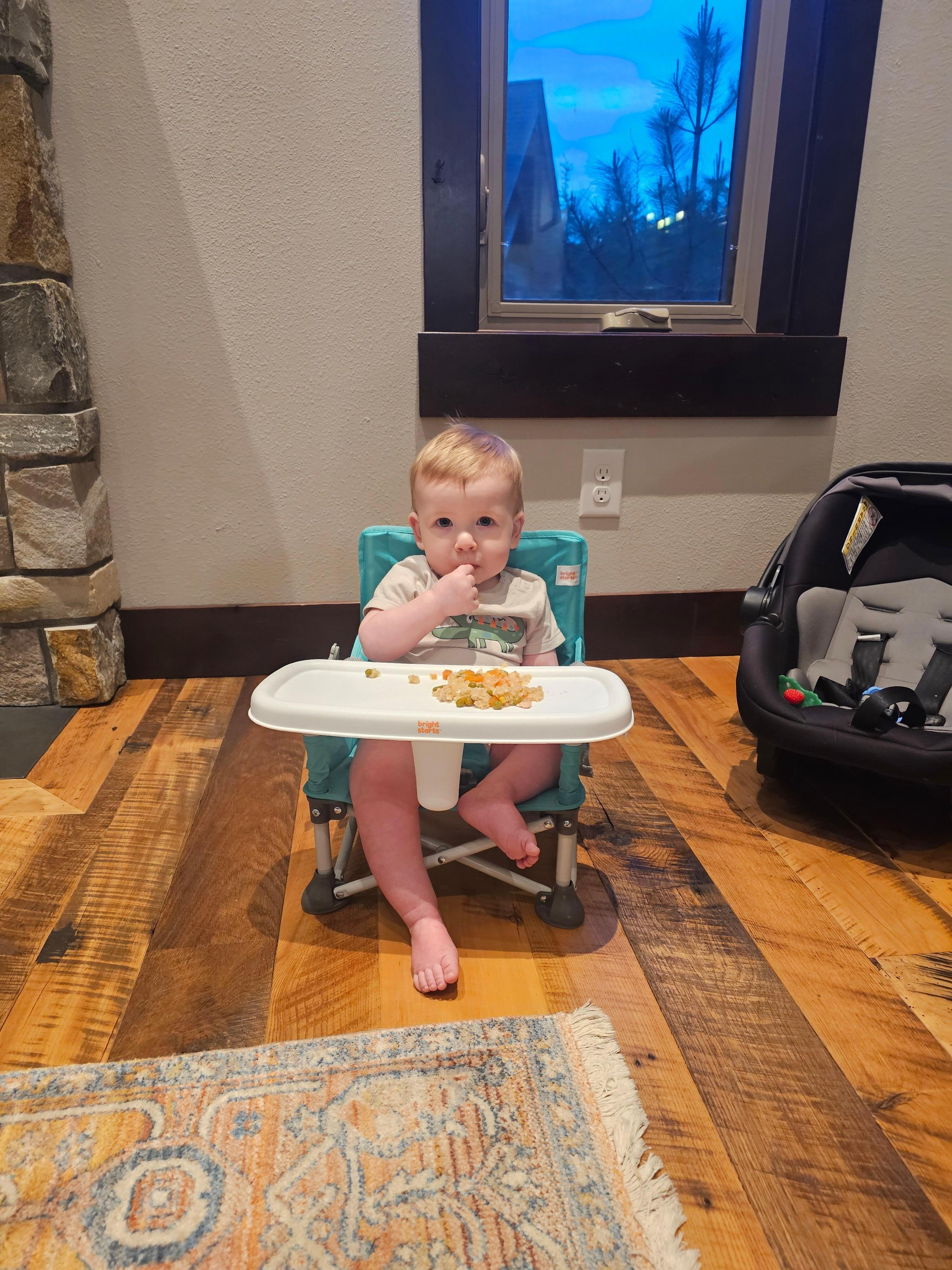 Baby boy having a snack