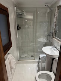 Bathroom was tiny expected, shower needs a bit of an upgrade but still functional with hot water which is also part of the character of this very old building