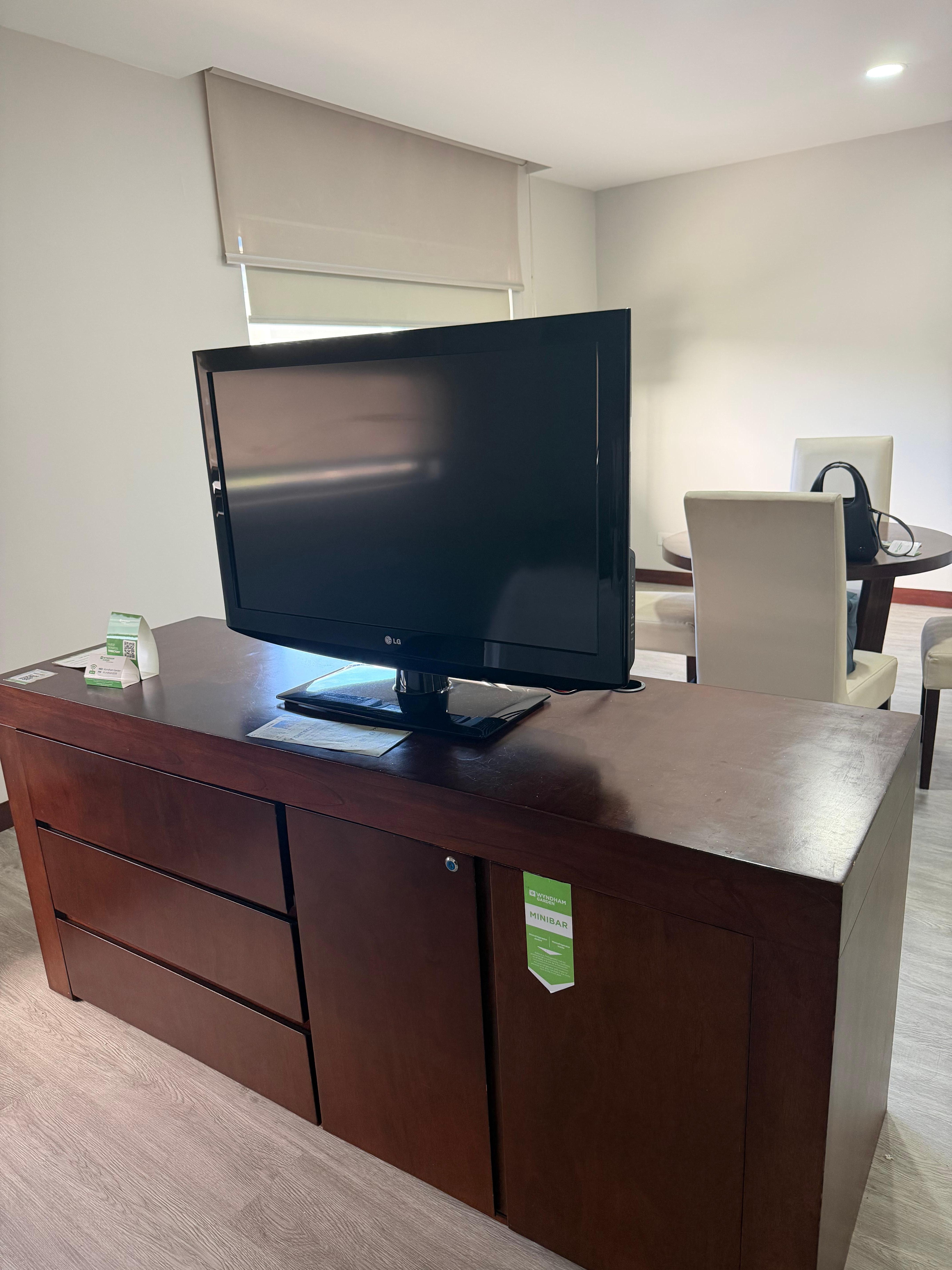 The TV is in a fixed position with limited channels