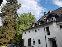 From the rear, outdoor dining to the left