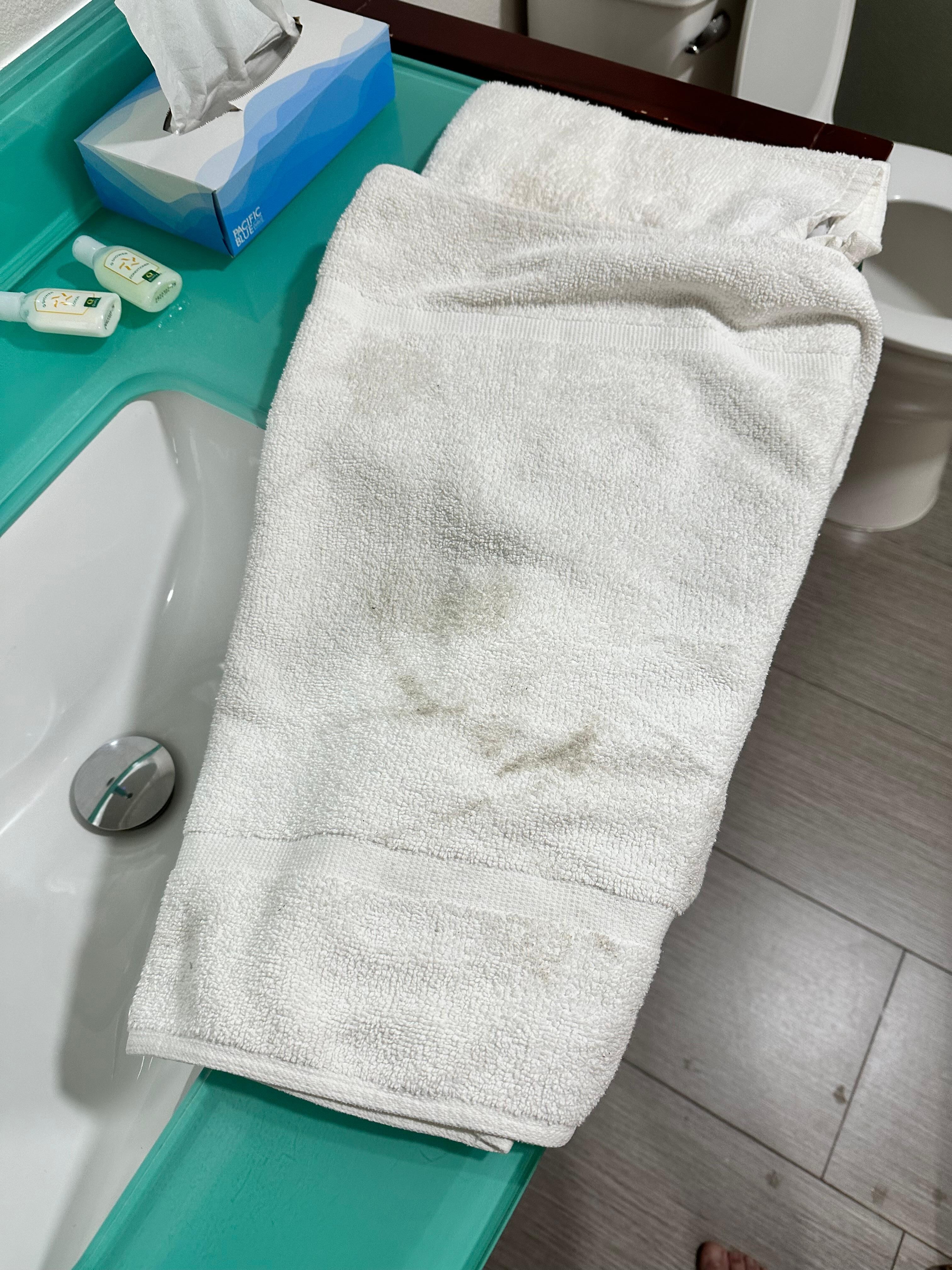 Wiped my feet on this towel after walking around the room 