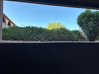 A wall and bushes!
No negotiations on upper room, they wanted more money for a Motel, Not even a Hotel! With crappy continental breakfast that sucked.