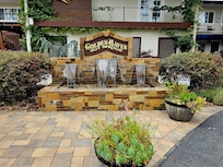 Entrance to office/spa and pool/hot tubs.