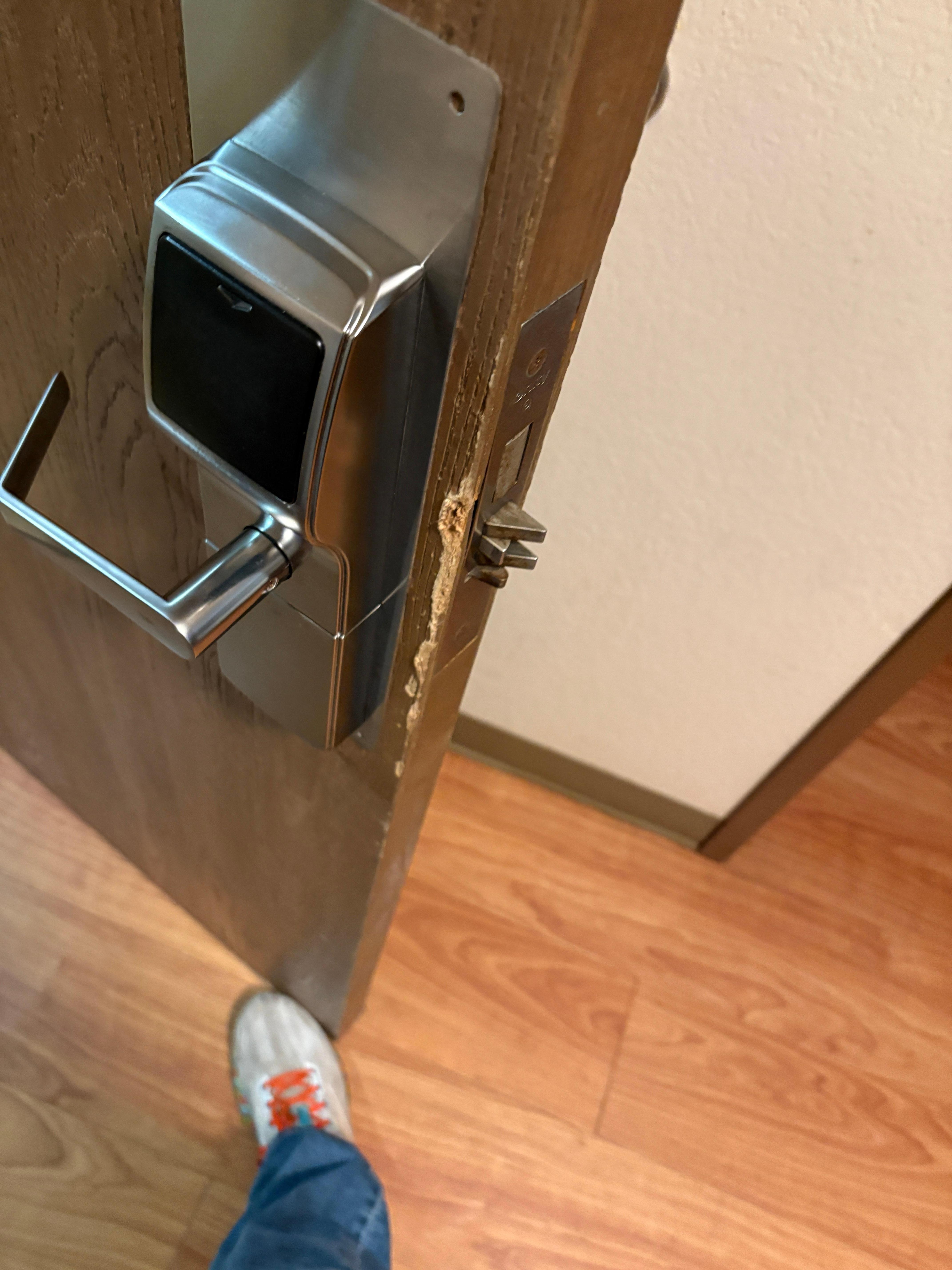 The door looked like it was falling apart and pryed open before. 